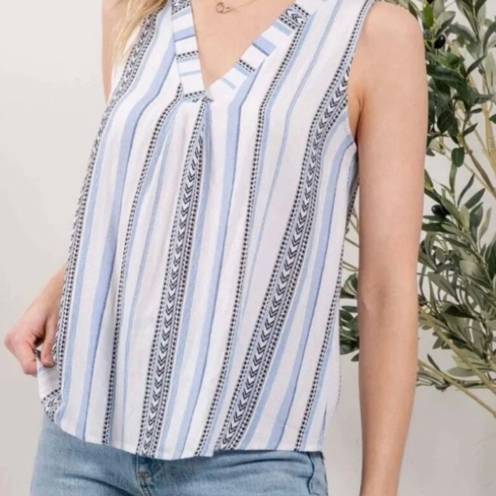 NWT Ladies sleeveless top. Brand is Mine. Size Medium